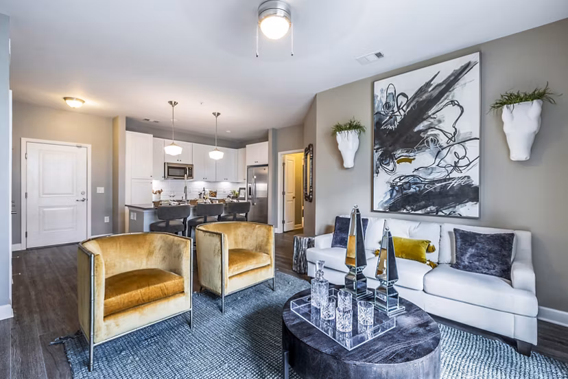 Spacious living room with elegant decor at Everleigh Cool Springs Apartments