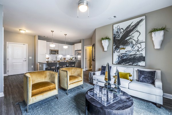 Spacious living room with elegant decor at Everleigh Cool Springs Apartments