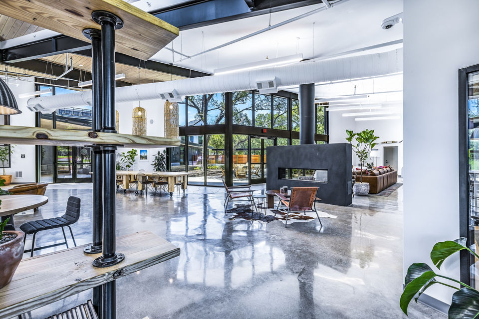 Clubhouse featuring modern design and cozy seating at Perch Apartments luxury community
