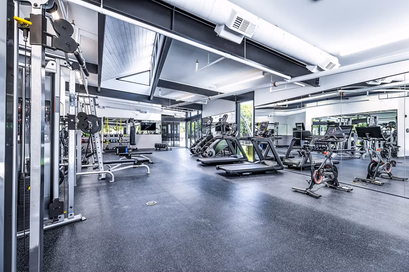 State-of-the-art fitness center featuring modern equipment at Perch Apartments, a luxury apartment community by Greystar