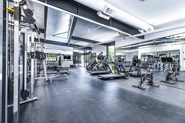 State-of-the-art fitness center featuring modern equipment at Perch Apartments, a luxury apartment community by Greystar