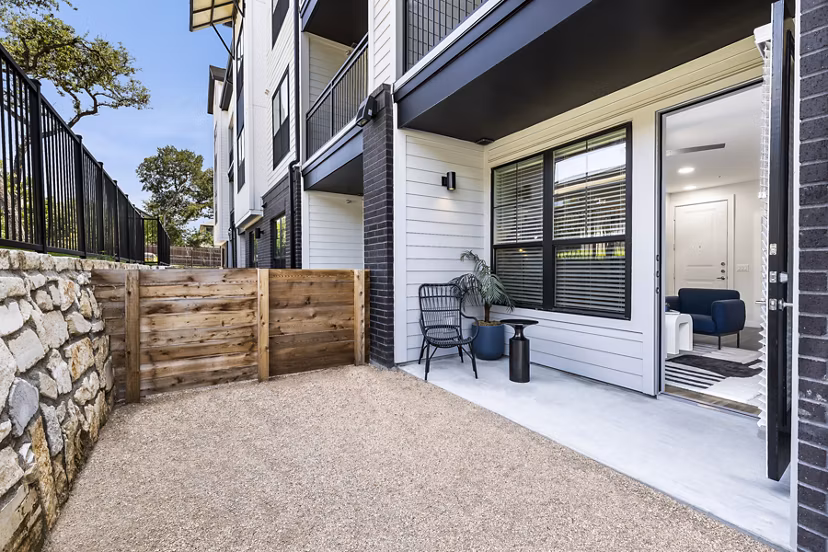 Private patio with modern outdoor furniture at Perch Apartments, a luxury living space for relaxation and entertainment