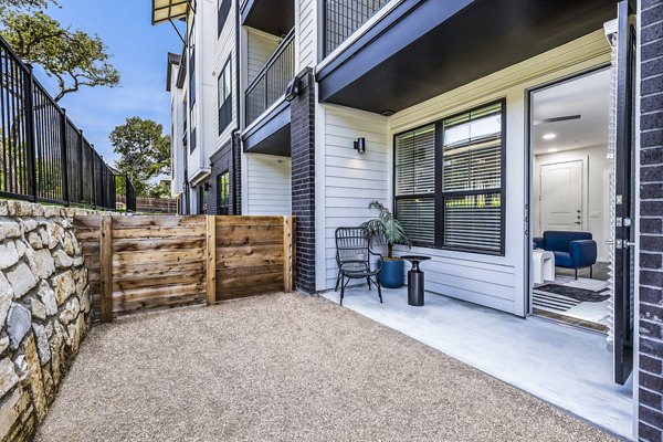 Private patio with modern outdoor furniture at Perch Apartments, a luxury living space for relaxation and entertainment