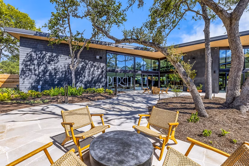 Patio with stylish outdoor seating at Perch Apartments, luxury living by Greystar