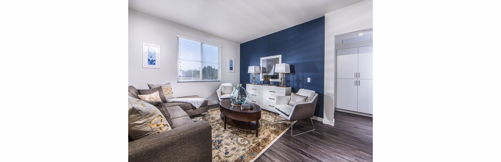Modern living room with sleek furniture and stylish decor in Haven76 Apartments