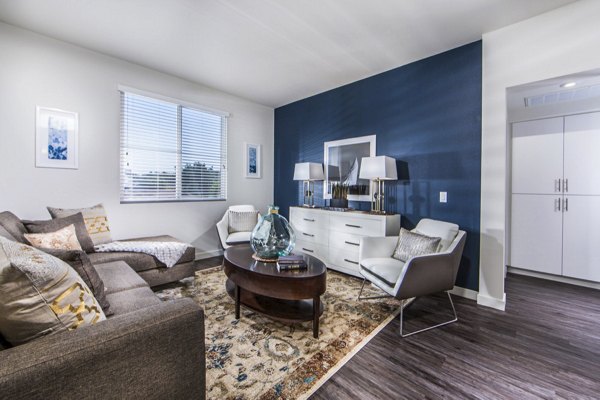 Modern living room with sleek furniture and stylish decor in Haven76 Apartments