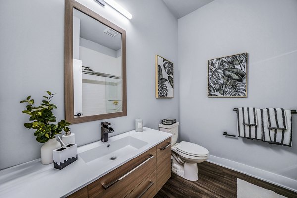 Modern bathroom with sleek fixtures at Beckon Collective Apartments