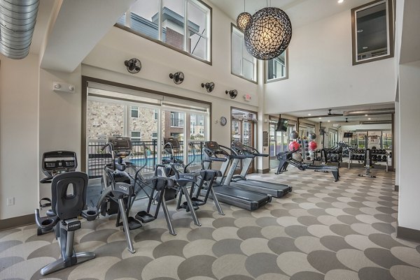 Fitness Center at Enclave at Woodland Lakes Apartments