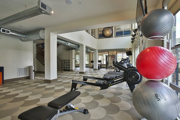Fitness Center at Enclave at Woodland Lakes Apartments
