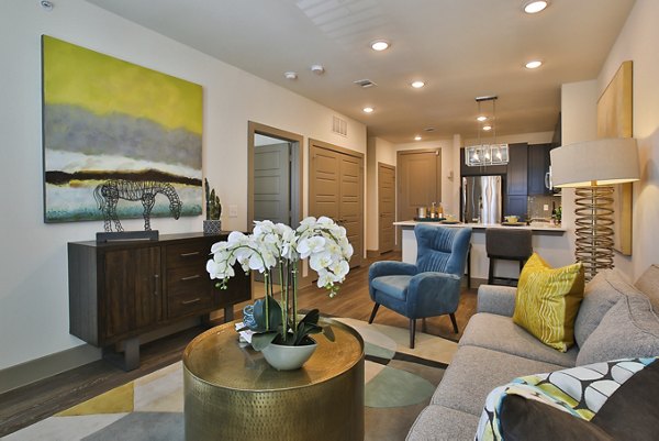 Living Room at Enclave at Woodland Lakes Apartments