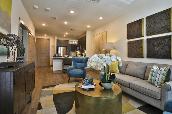 Living Room at Enclave at Woodland Lakes Apartments