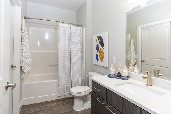 Bathroom with modern fixtures at 644 City Station Apartments