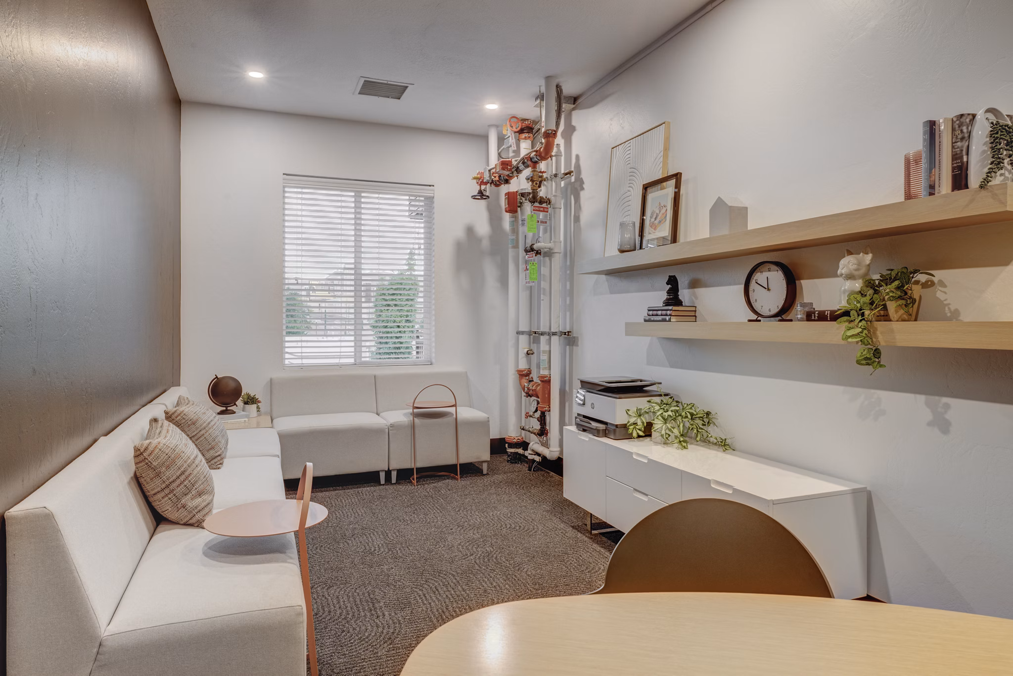 Modern clubhouse with stylish seating and game areas at 644 City Station Apartments