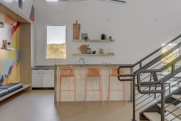 Clubhouse with modern furnishings at 644 City Station Apartments