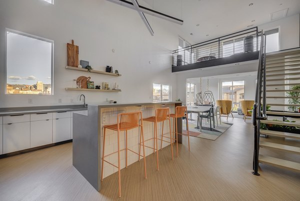 Elegant clubhouse featuring modern decor and comfortable seating at 644 City Station Apartments