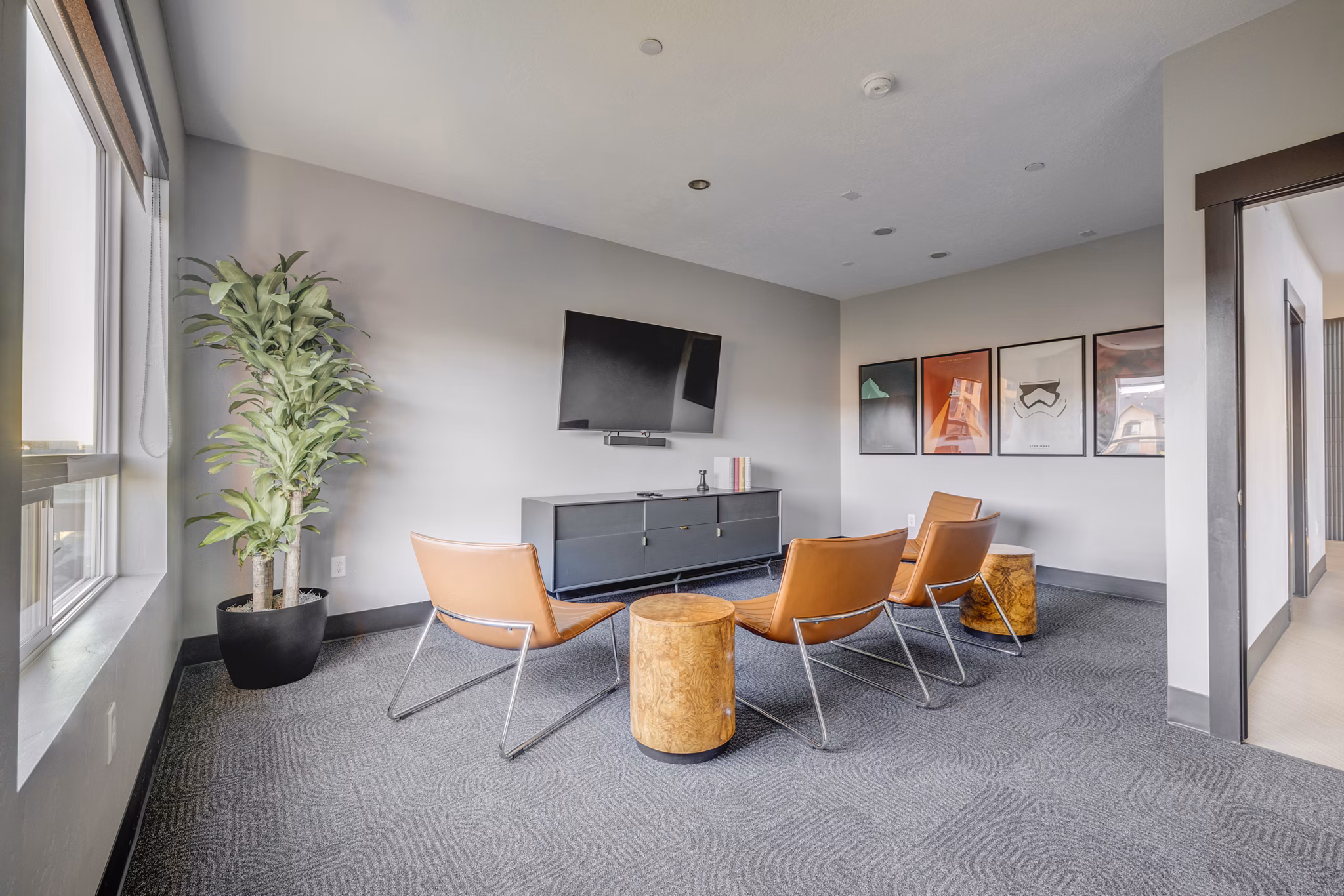 Clubhouse at 644 City Station Apartments featuring modern design and community seating areas Perfect for social gatherings and events