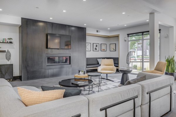 Clubhouse featuring modern design and comfortable seating at 644 City Station Apartments