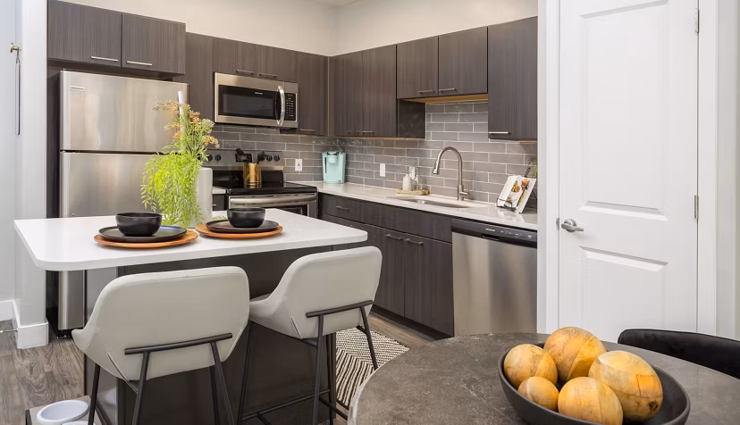 Dining area with modern decor and sleek furnishings at 644 City Station Apartments
