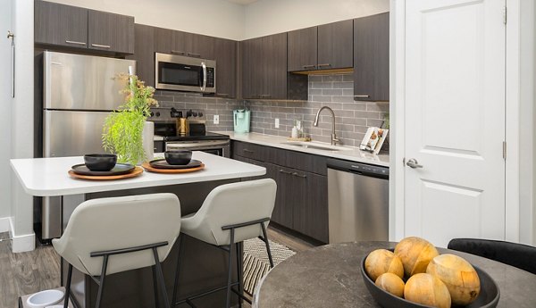 Dining area with modern decor and sleek furnishings at 644 City Station Apartments