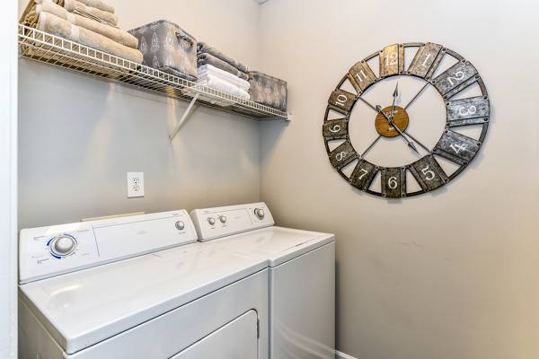 laundry room at Assembly Eagles Landing Apartments