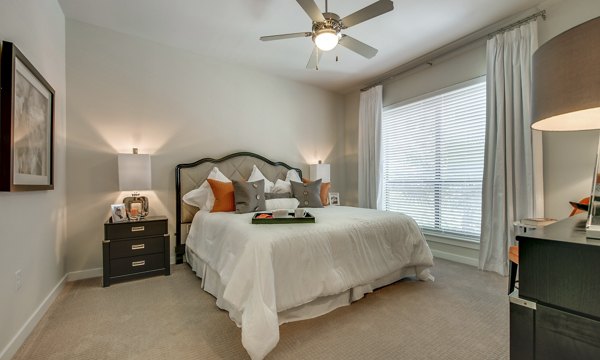 Cozy bedroom with modern decor at 2900 West Dallas Apartments, Greystar luxury apartments in prime location