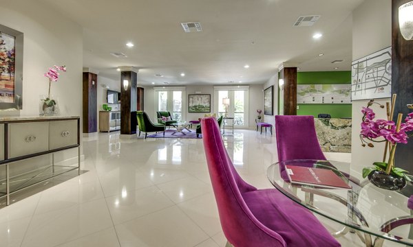Clubhouse featuring modern seating and game tables at 2900 West Dallas Apartments