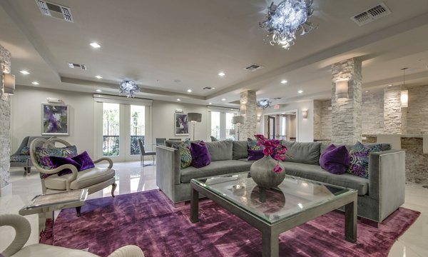 Contemporary clubhouse with modern seating and vibrant decor at 2900 West Dallas Apartments