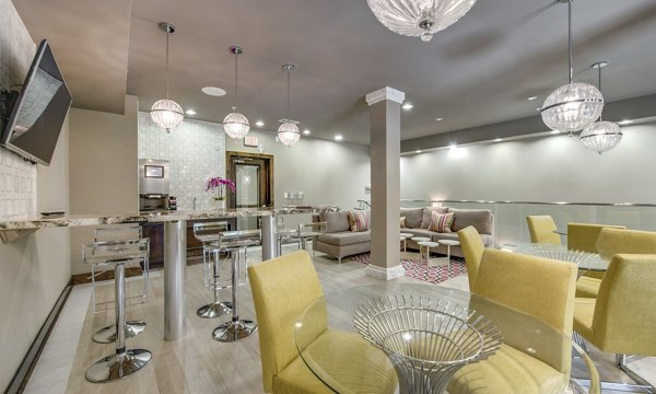 Clubhouse featuring modern seating and entertainment areas at 2900 West Dallas Apartments