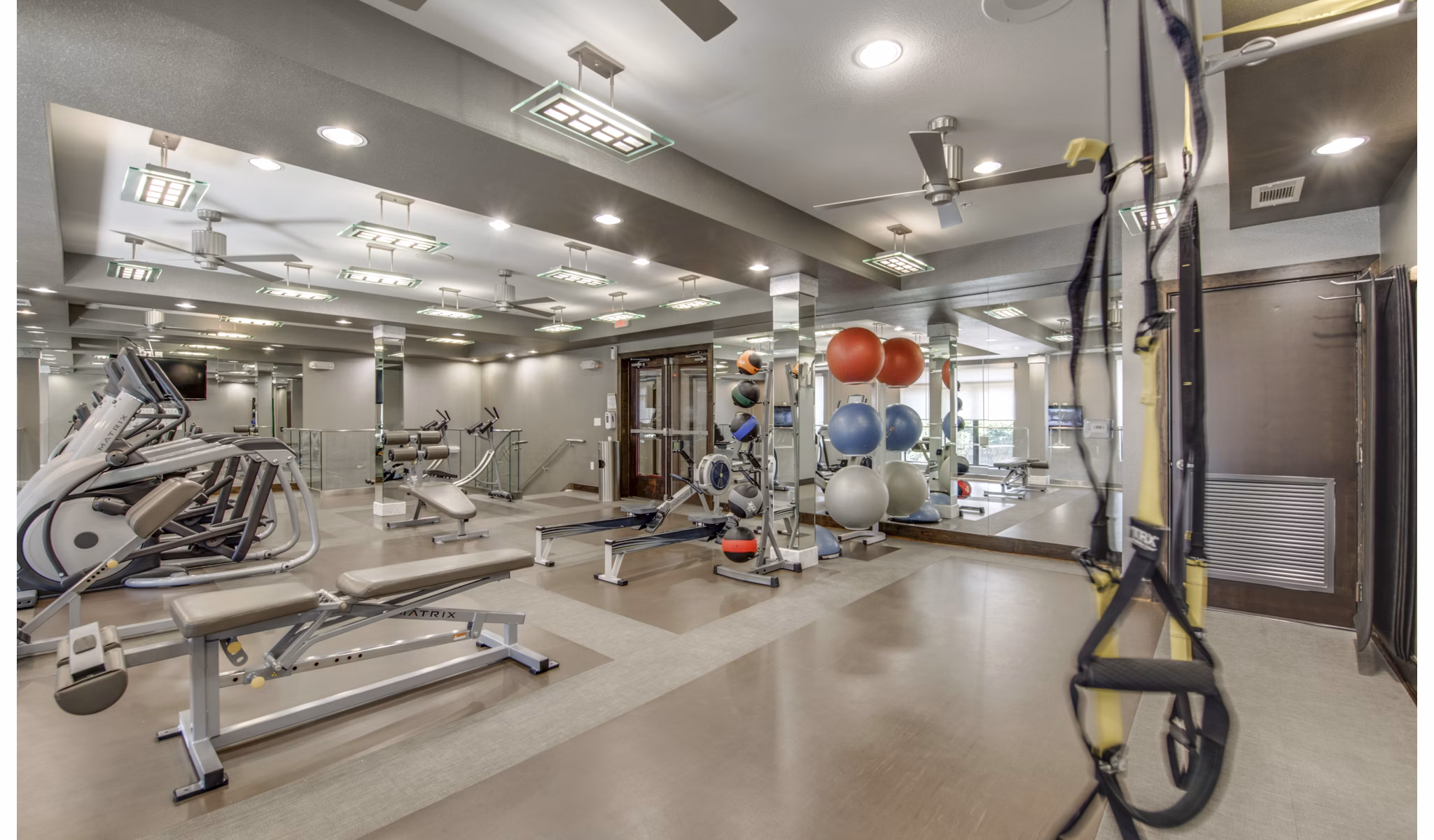 State-of-the-art fitness center featuring modern equipment at 2900 West Dallas Apartments