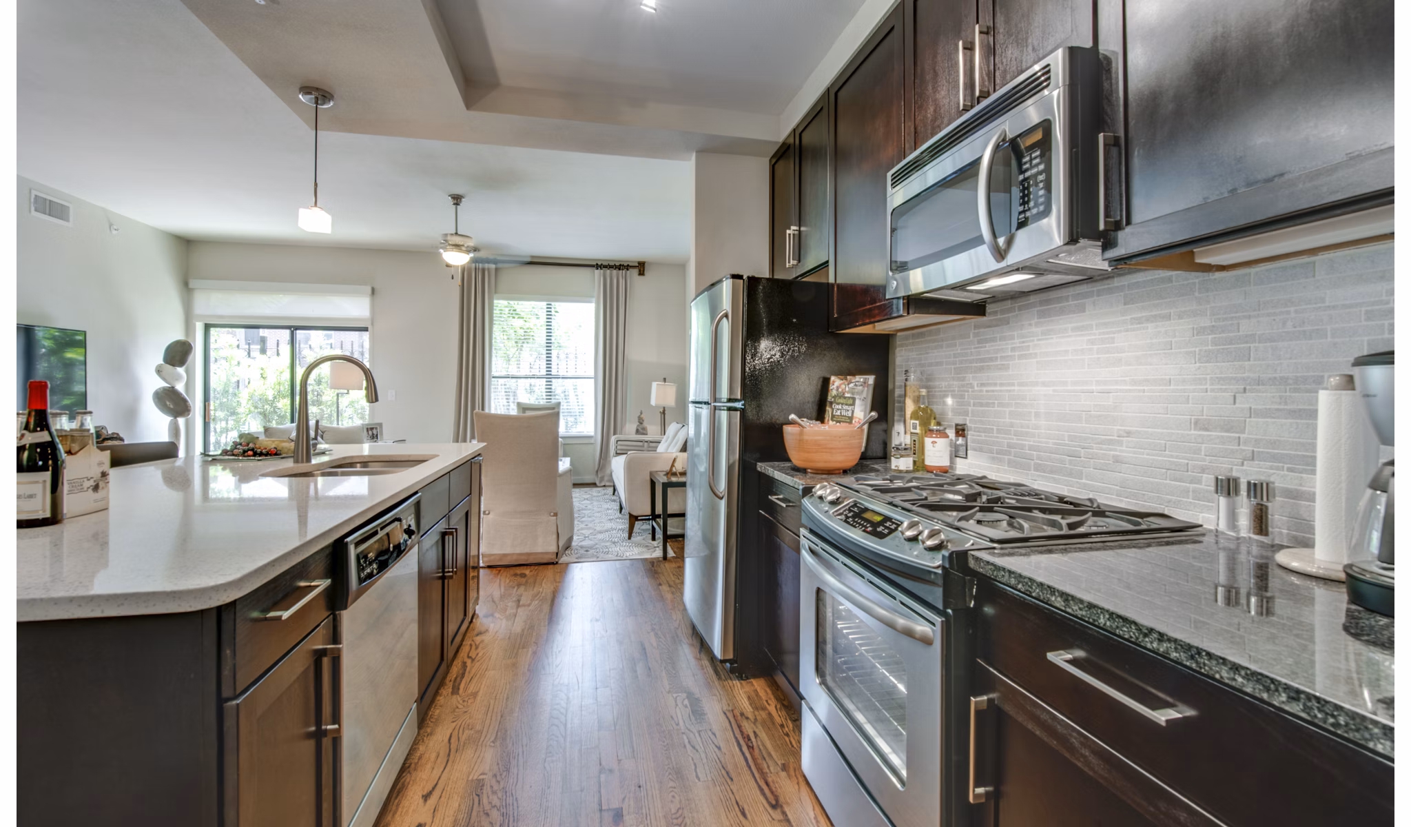 Modern kitchen featuring stainless steel appliances at 2900 West Dallas Apartments