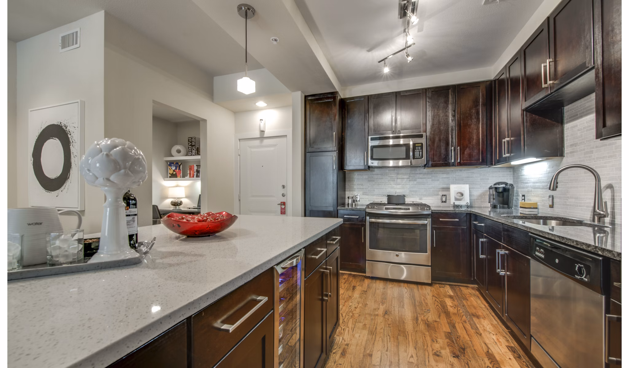Modern kitchen featuring sleek cabinetry and stainless steel appliances at 2900 West Dallas Apartments