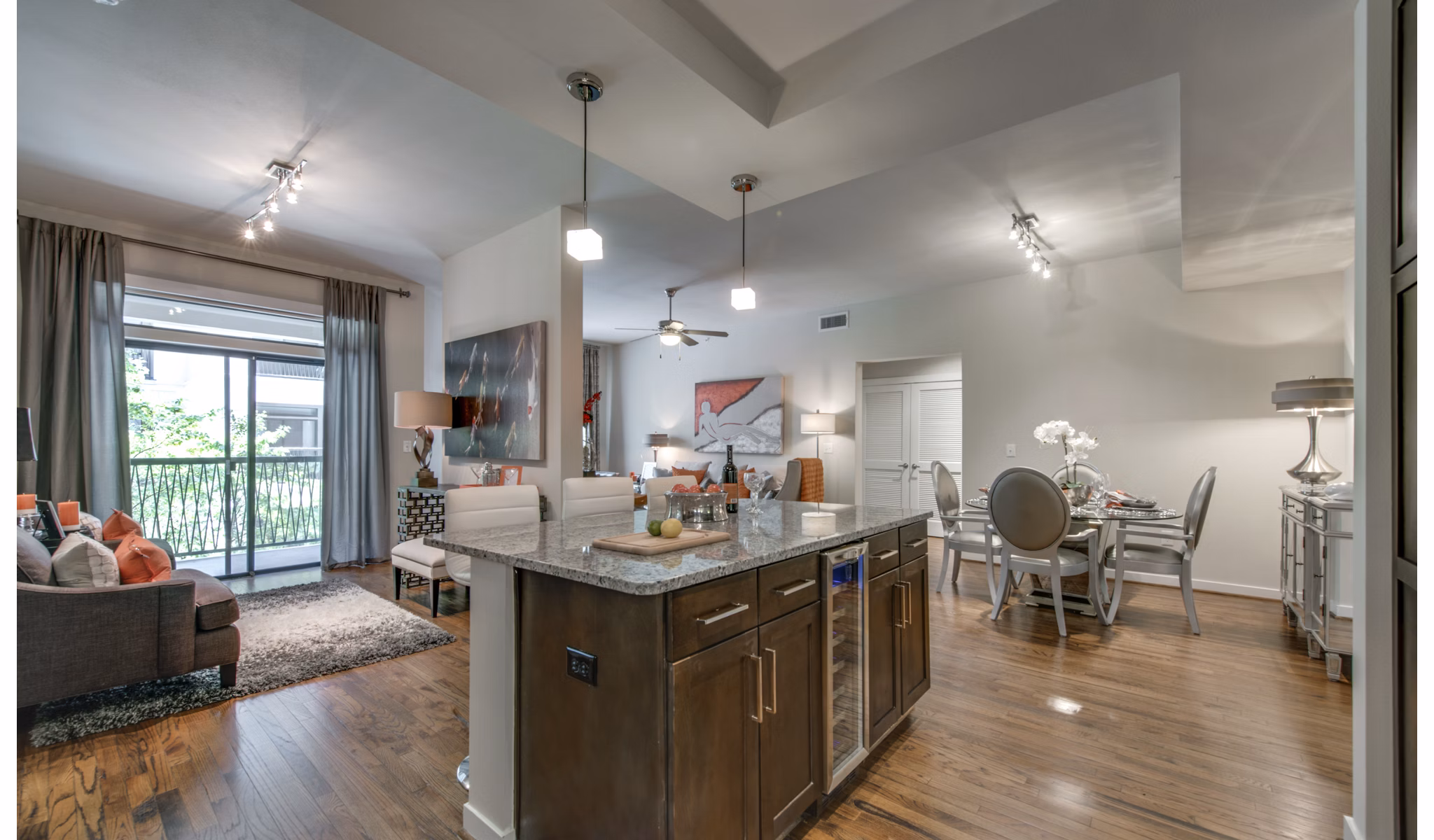 Contemporary kitchen with stainless steel appliances at 2900 West Dallas Apartments