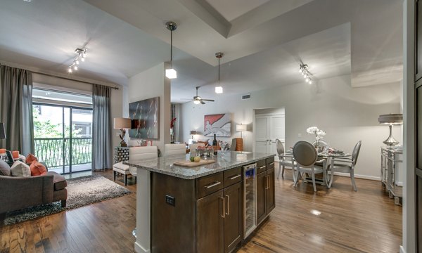 Contemporary kitchen with stainless steel appliances at 2900 West Dallas Apartments