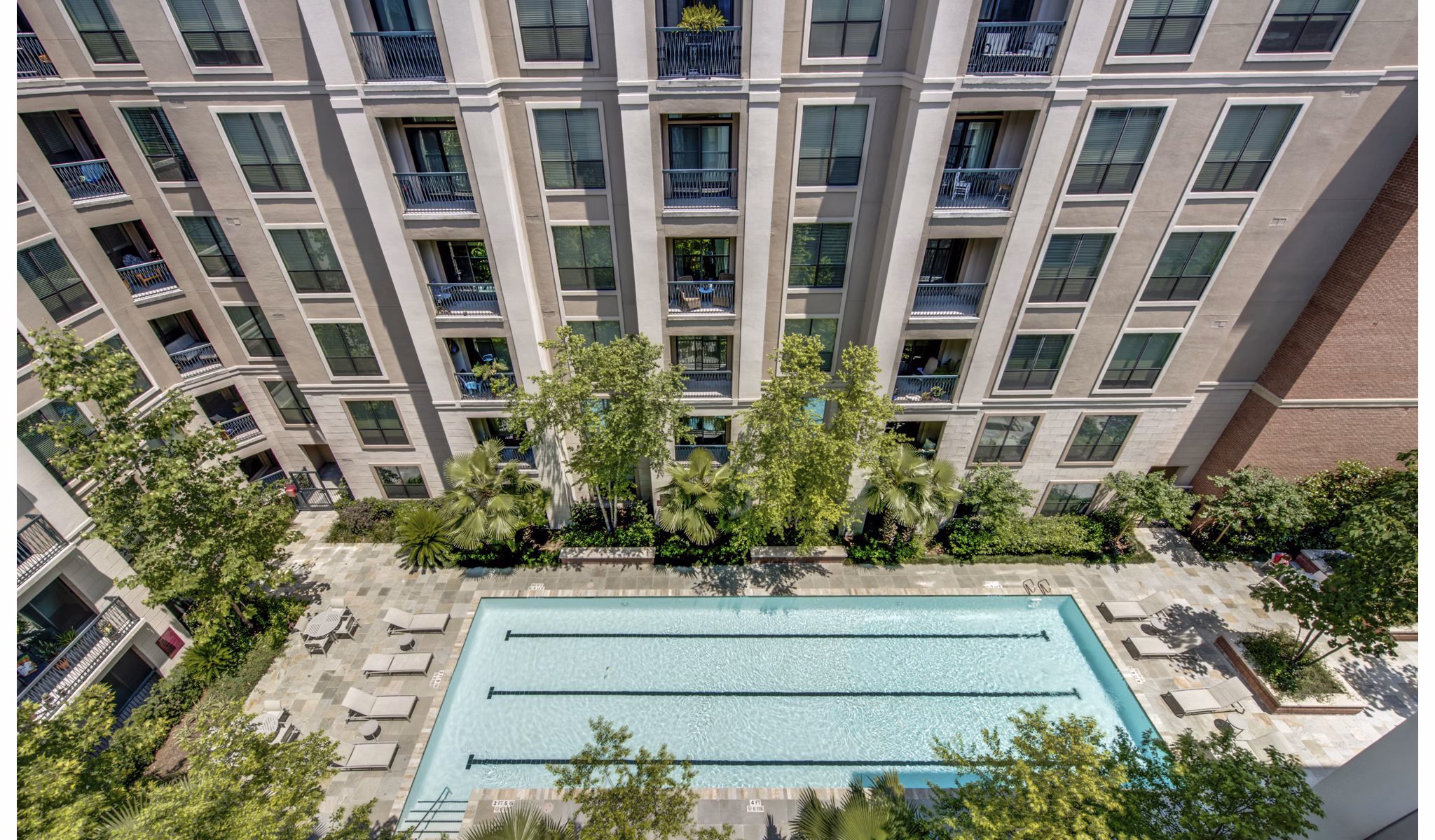 Resort-style pool area at 2900 West Dallas Apartments offering luxury relaxation and modern amenities, perfect for residents seeking comfort