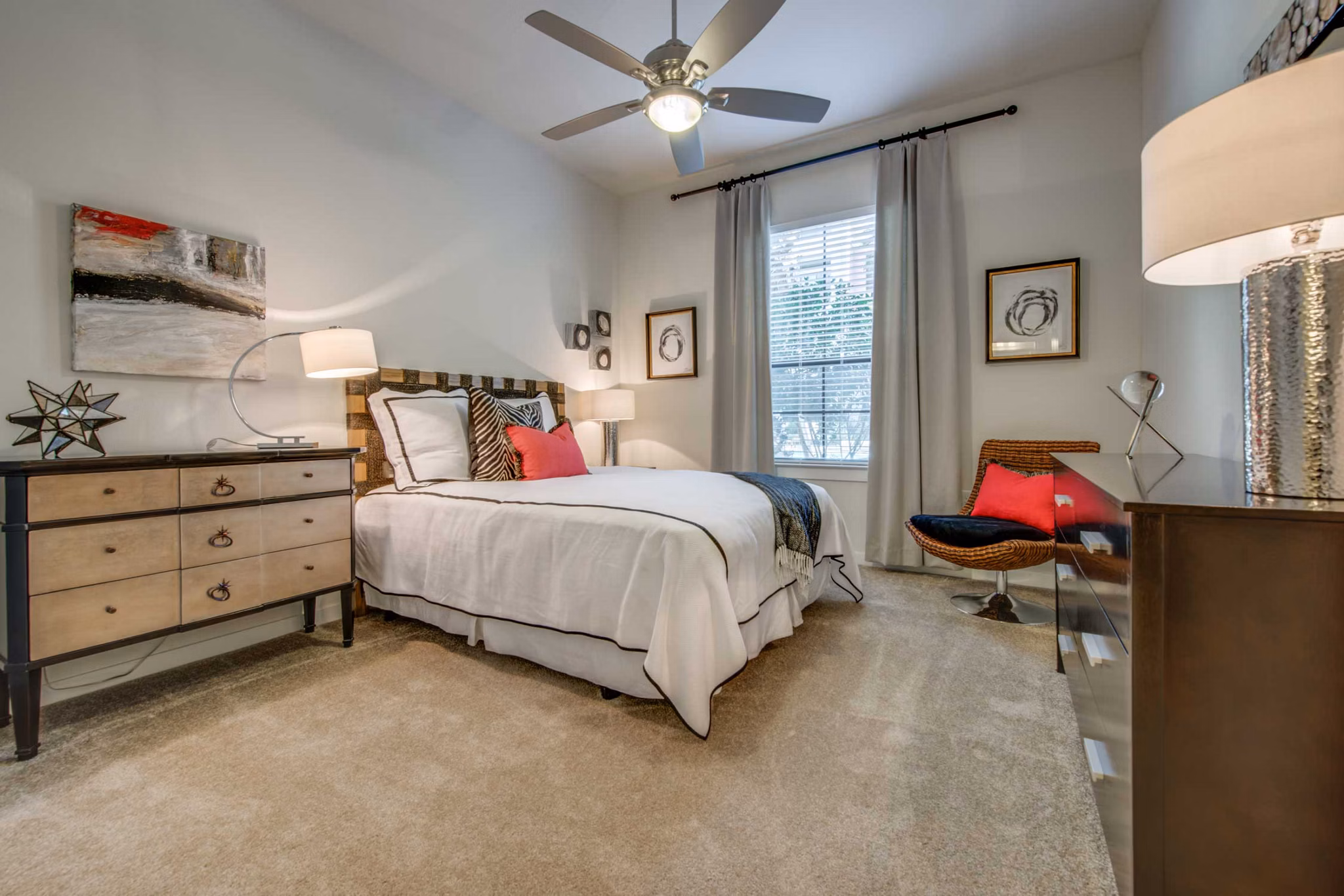 Cozy bedroom with stylish decor at Grove at Wilcrest Apartments