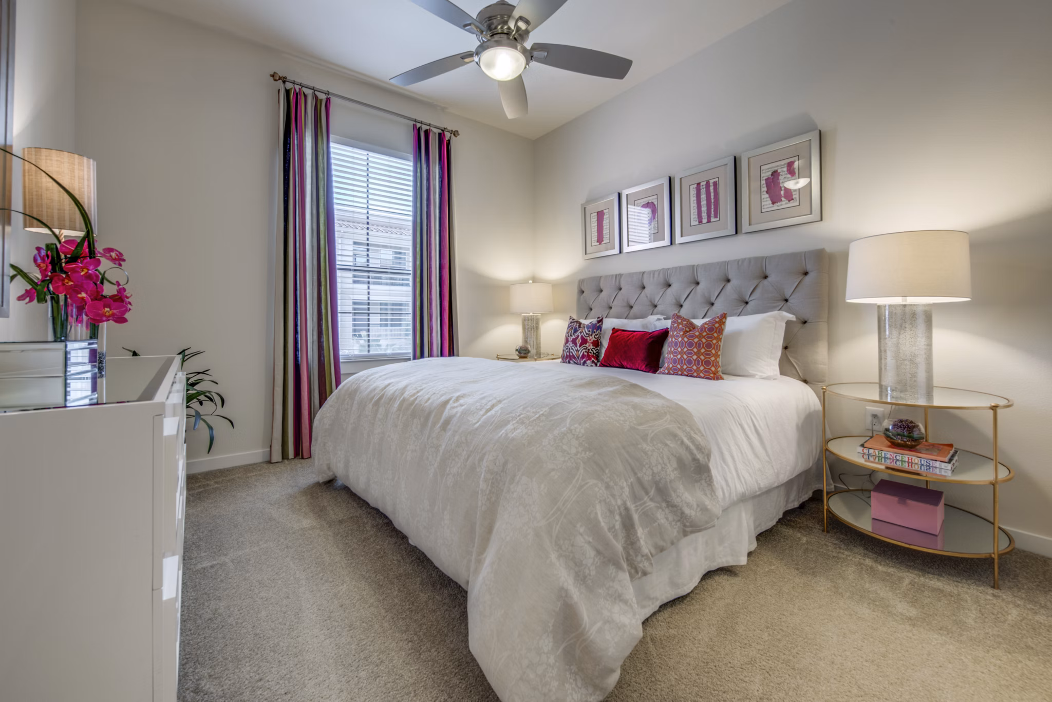Cozy bedroom featuring plush bedding and modern decor at Grove at Wilcrest Apartments