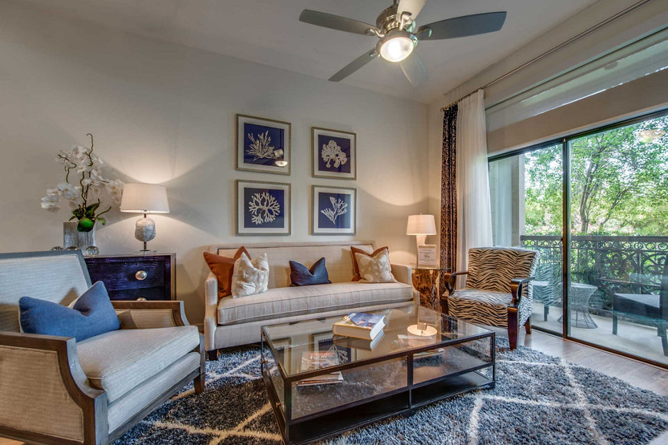 Spacious living room with modern decor at Grove at Wilcrest Apartments