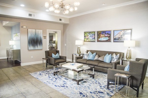 Elegant clubhouse with modern furnishings at Jackson Hill Apartments, perfect for gatherings and relaxation