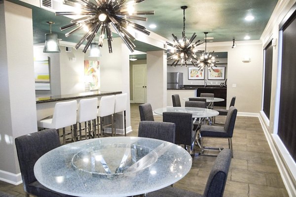 Elegant clubhouse interior with modern decor and plush seating at Jackson Hill Apartments
