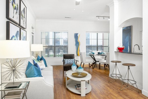 Modern clubhouse with cozy seating and entertainment options at Jackson Hill Apartments
