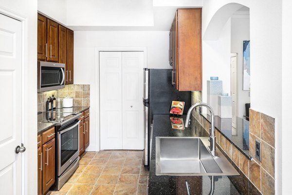 Clubhouse with modern design and ample seating at Jackson Hill Apartments