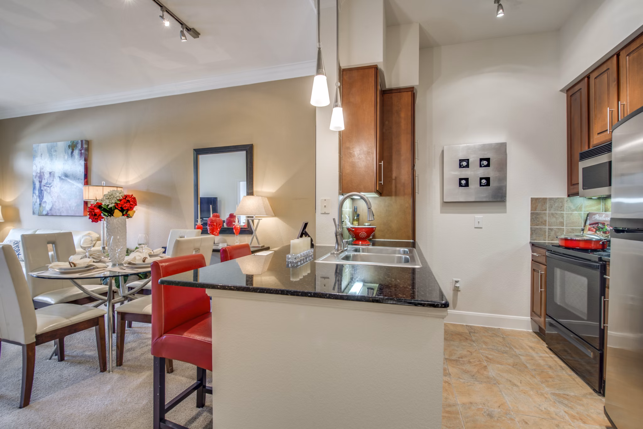 Modern kitchen with stainless steel appliances at Jackson Hill Apartments