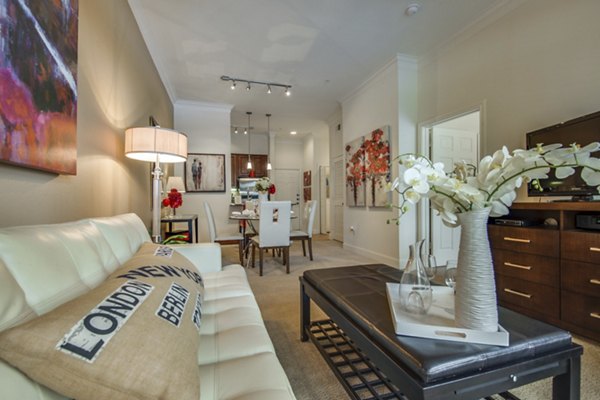 Living room featuring modern furnishings at Jackson Hill Apartments with luxury design elements and ample natural light