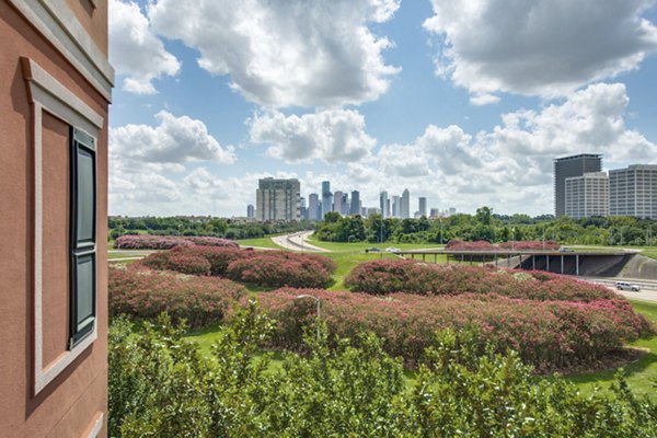 Stunning city views from a modern balcony at Jackson Hill Apartments