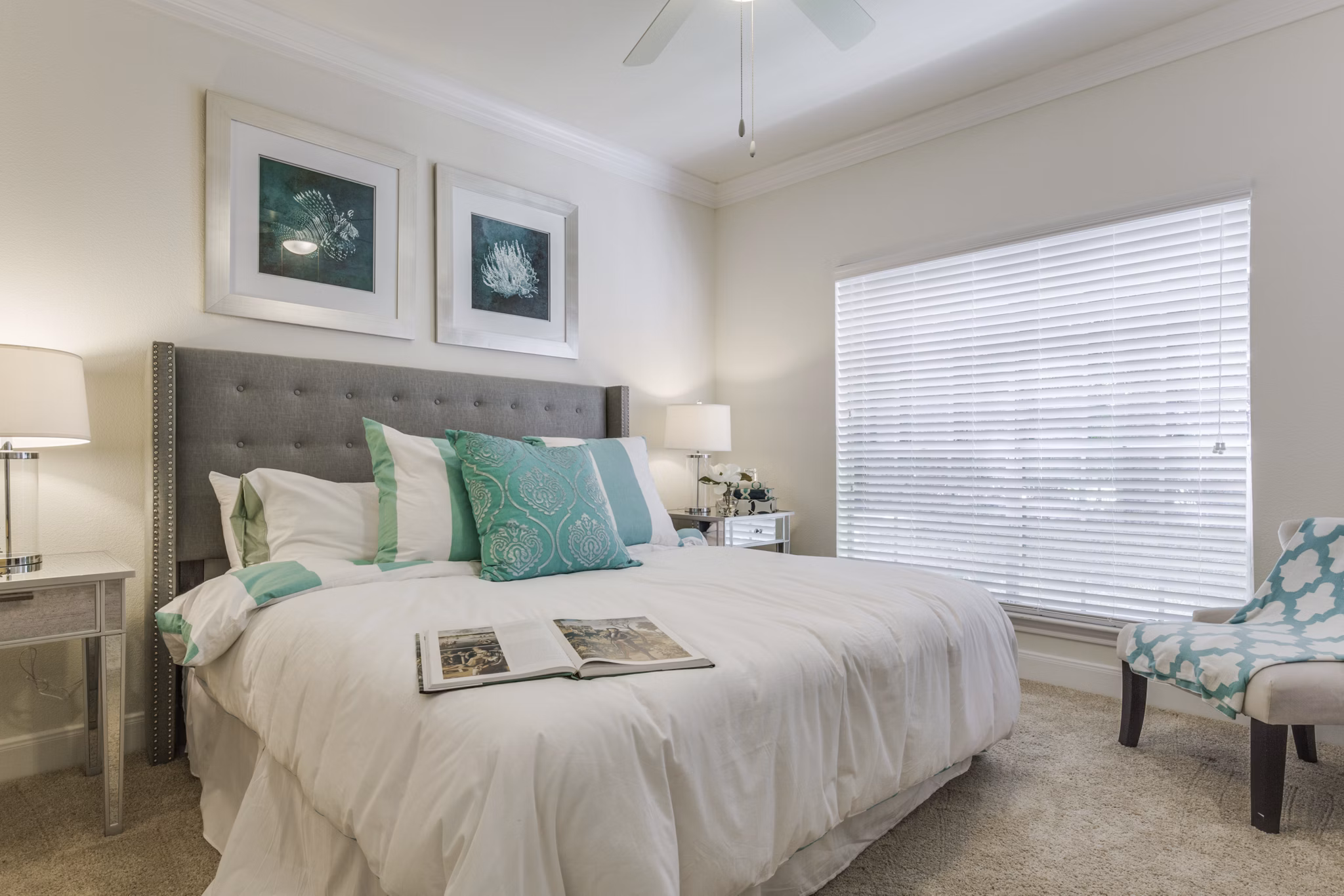 Modern bedroom with elegant decor and natural lighting at Las Palmas Apartments