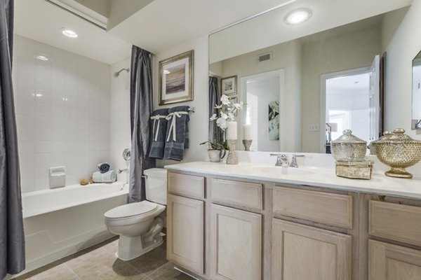 Modern bathroom with sleek fixtures at Las Palmas Apartments featuring luxury finishes and elegant design