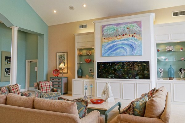 Clubhouse featuring elegant decor and spacious seating at Las Palmas Apartments