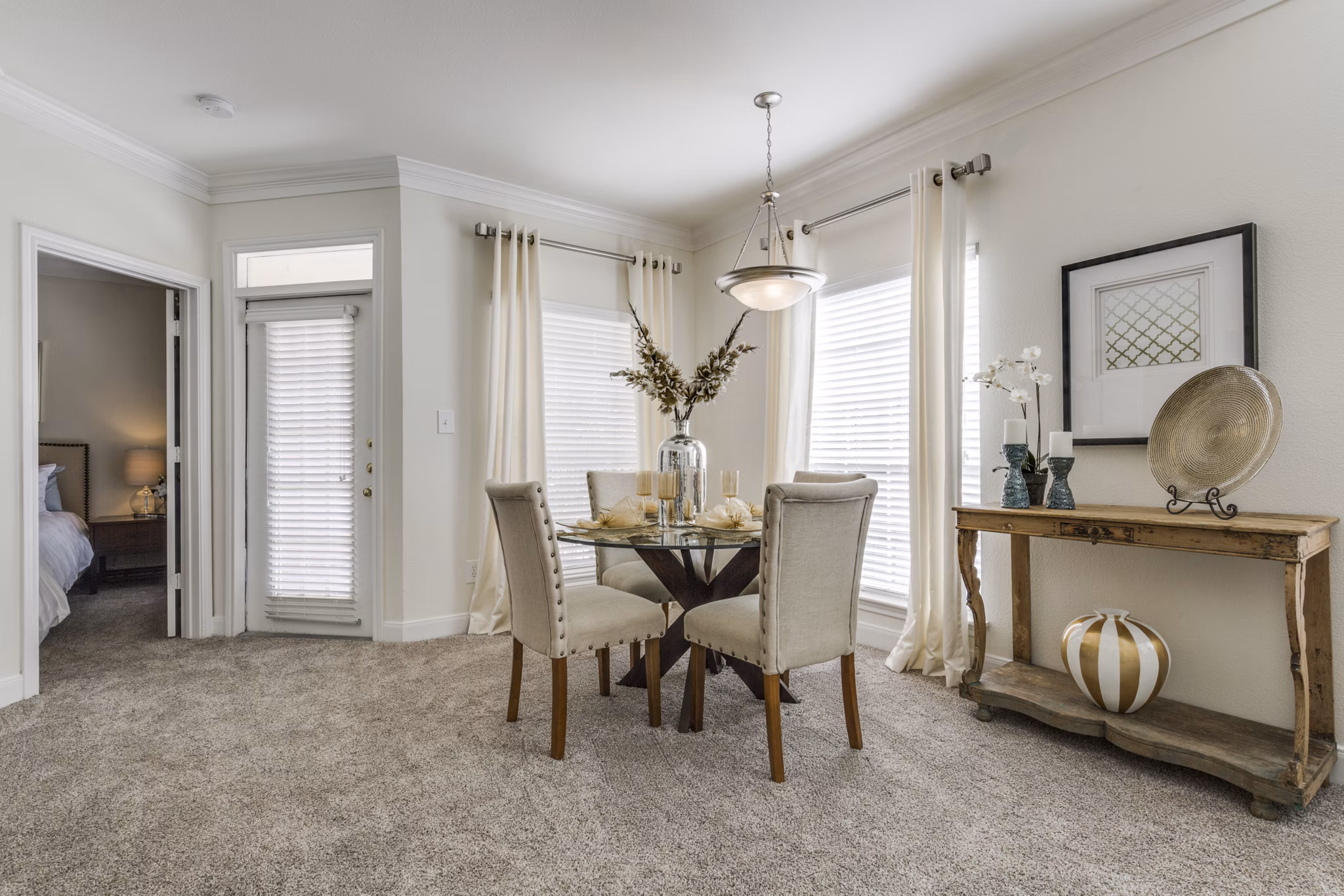 Dining area featuring elegant design and modern furnishings at Las Palmas Apartments