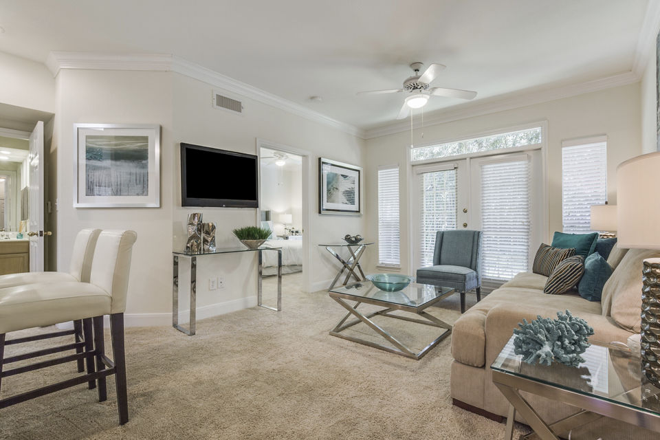 Modern living room with sleek furniture at Las Palmas Apartments