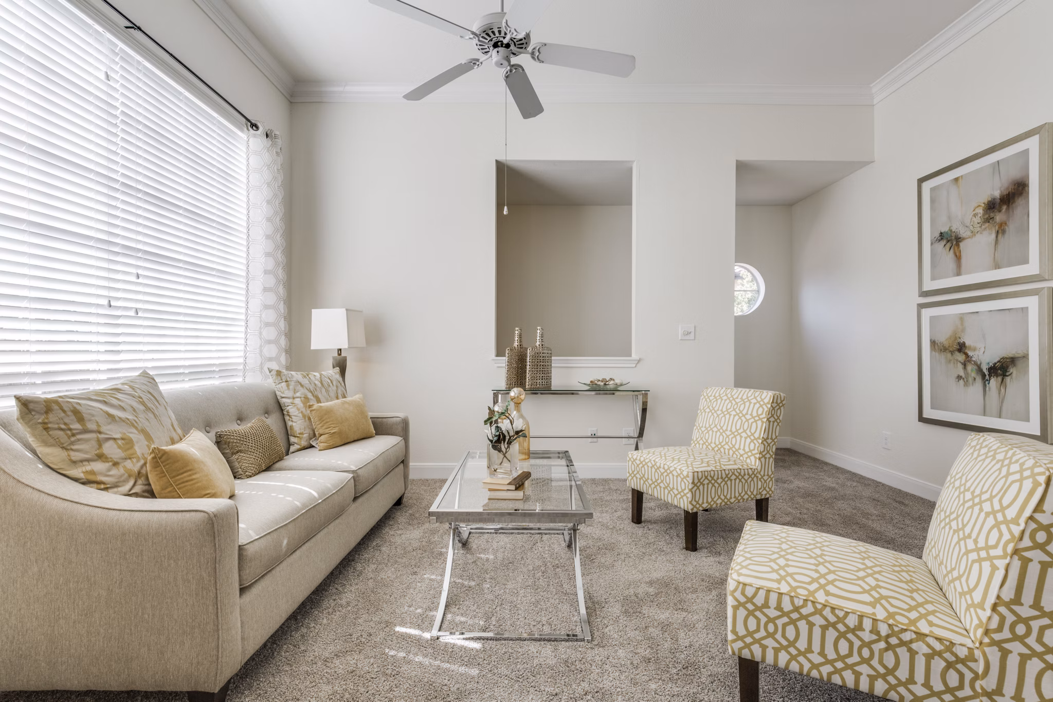 Spacious living room with contemporary furnishings at Las Palmas Apartments